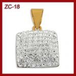 Złota zawieszka z kryształkami